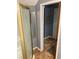 Bathroom featuring shower with gold accents and neutral tile flooring at 6498 Se 167Th Ct, Ocklawaha, FL 32179