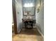 Unique bathroom with a vessel sink on repurposed sewing machine base and blue textured walls at 6498 Se 167Th Ct, Ocklawaha, FL 32179