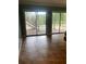 View of a room featuring tile flooring, and sliding glass doors to the outside at 6498 Se 167Th Ct, Ocklawaha, FL 32179