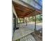 Spacious outdoor patio area with room for entertaining and enjoying the backyard view at 6498 Se 167Th Ct, Ocklawaha, FL 32179