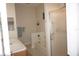 Bright bathroom with a walk-in shower and double sinks at 6836 Sw 112Th St, Ocala, FL 34476
