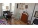 Bright bedroom with wood floors, fan, daybed, and large windows at 6836 Sw 112Th St, Ocala, FL 34476