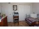 Bedroom featuring a daybed, closet, and natural light at 6836 Sw 112Th St, Ocala, FL 34476