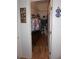 Walk-in closet with wooden floor at 6836 Sw 112Th St, Ocala, FL 34476