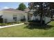 A charming home featuring meticulously maintained landscaping and a serene, inviting atmosphere at 6836 Sw 112Th St, Ocala, FL 34476