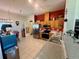 Traditional eat-in kitchen with stainless steel appliances, wooden cabinets, and tile flooring at 6836 Sw 112Th St, Ocala, FL 34476