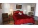 Cozy bedroom with a large bed, neutral walls, and bright natural light at 6836 Sw 112Th St, Ocala, FL 34476