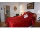 Inviting bedroom with neutral walls, an ensuite bathroom, and lots of natural light at 6836 Sw 112Th St, Ocala, FL 34476
