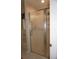 Bathroom shower features a frosted glass enclosure and a tiled floor at 6836 Sw 112Th St, Ocala, FL 34476