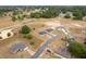 High angle aerial view of multiple single Gathering homes in a suburban neighborhood at 69 Juniper Trail Loop, Ocala, FL 34480