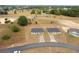 Aerial view of two single-story homes with driveways on a generous lot in a suburban neighborhood at 69 Juniper Trail Loop, Ocala, FL 34480