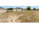 Exterior view of the rear of the home, including the siding and backyard at 69 Juniper Trail Loop, Ocala, FL 34480