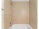 Bathroom features a tiled shower-tub combination at 69 Juniper Trail Loop, Ocala, FL 34480
