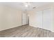 Bedroom features a neutral color palette, ceiling fan and closet at 69 Juniper Trail Loop, Ocala, FL 34480