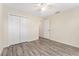 This room has wood-style floors, ceiling fan, and a double door closet at 69 Juniper Trail Loop, Ocala, FL 34480