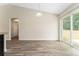 Dining area boasts bright sliding glass doors that lead to backyard at 69 Juniper Trail Loop, Ocala, FL 34480