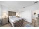 Neutral bedroom with decorative bed frame and bedside tables at 7706 Sw 89Th Ct, Ocala, FL 34481