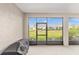 Covered lanai with views of the landscaped backyard at 7706 Sw 89Th Ct, Ocala, FL 34481