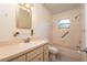 Traditional bathroom with a neutral color, a vanity and sink, and a shower-tub combination at 8654 Sw 96Th St # D, Ocala, FL 34481