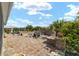 Paver patio with a fire pit and lovely landscaping at 8998 Sw 75Th Loop, Ocala, FL 34481
