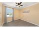 Bedroom features natural light and carpet at 8998 Sw 75Th Loop, Ocala, FL 34481