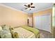 Bedroom with ceiling fan and carpet at 8998 Sw 75Th Loop, Ocala, FL 34481