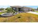 Charming single-story home with manicured landscaping and a two-car garage, creating great curb appeal at 8998 Sw 75Th Loop, Ocala, FL 34481