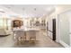 Open concept kitchen with large island, stainless appliances, and view to the living room at 8998 Sw 75Th Loop, Ocala, FL 34481