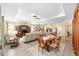 Expansive living area with open layout connecting the kitchen, dining, and seating spaces at 8998 Sw 75Th Loop, Ocala, FL 34481