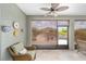 Relaxing screened patio with wicker furniture and view of backyard at 8998 Sw 75Th Loop, Ocala, FL 34481