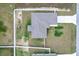 Aerial shot of a single Gathering home showing the roof, yard and driveway at 9 Walnut Run, Ocala, FL 34480