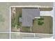 An aerial view of the house showcasing its layout, surrounding landscape, and fenced-in backyard at 9 Walnut Run, Ocala, FL 34480