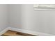 Neutral bedroom with oak wood flooring at 9 Walnut Run, Ocala, FL 34480