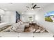Open-concept living space featuring stylish furniture, modern design and wood flooring for comfortable living at 9 Walnut Run, Ocala, FL 34480