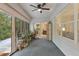 Bright sunroom filled with plants and natural light, seamlessly blending indoor and outdoor living at 9565 Sw 194Th Cir, Dunnellon, FL 34432