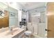 Bright bathroom with walk-in bathtub, stylish vanity, and ample storage space at 10140 Sw 81St Terrace Rd, Ocala, FL 34481