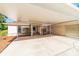 Single-story house with carport, driveway, and a neutral exterior color, offering convenience and curb appeal at 10140 Sw 81St Terrace Rd, Ocala, FL 34481