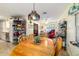 Dining area with a view to the kitchen and backyard at 10140 Sw 81St Terrace Rd, Ocala, FL 34481
