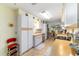 Galley kitchen featuring white cabinets and tile flooring at 10140 Sw 81St Terrace Rd, Ocala, FL 34481