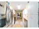 Long galley kitchen with modern stainless steel appliances at 10140 Sw 81St Terrace Rd, Ocala, FL 34481