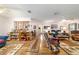 Open living room with wood floors and a view to the second living area at 10140 Sw 81St Terrace Rd, Ocala, FL 34481