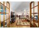View of the home's living room, showcasing its open layout and connection to other living spaces at 10140 Sw 81St Terrace Rd, Ocala, FL 34481