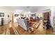 Cozy living space featuring a comfortable seating area and access to additional rooms, promoting seamless living at 10140 Sw 81St Terrace Rd, Ocala, FL 34481