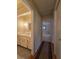 Hallway with bathroom vanity and access to bedroom area at 10330 Sw 99Th Ave, Ocala, FL 34481