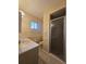 Bathroom featuring a tiled shower and single sink vanity at 10330 Sw 99Th Ave, Ocala, FL 34481