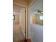 Carpeted bedroom with view to adjoining room at 10330 Sw 99Th Ave, Ocala, FL 34481
