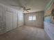 Bright bedroom with ample closet space and a ceiling fan at 10330 Sw 99Th Ave, Ocala, FL 34481