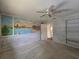 Bedroom featuring a mural and built-in shelves, creating a unique and charming space at 10330 Sw 99Th Ave, Ocala, FL 34481