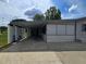 Carport and side of home, with lattice detail at 10330 Sw 99Th Ave, Ocala, FL 34481