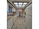 Kitchen with bright skylight and modern appliances at 10330 Sw 99Th Ave, Ocala, FL 34481
